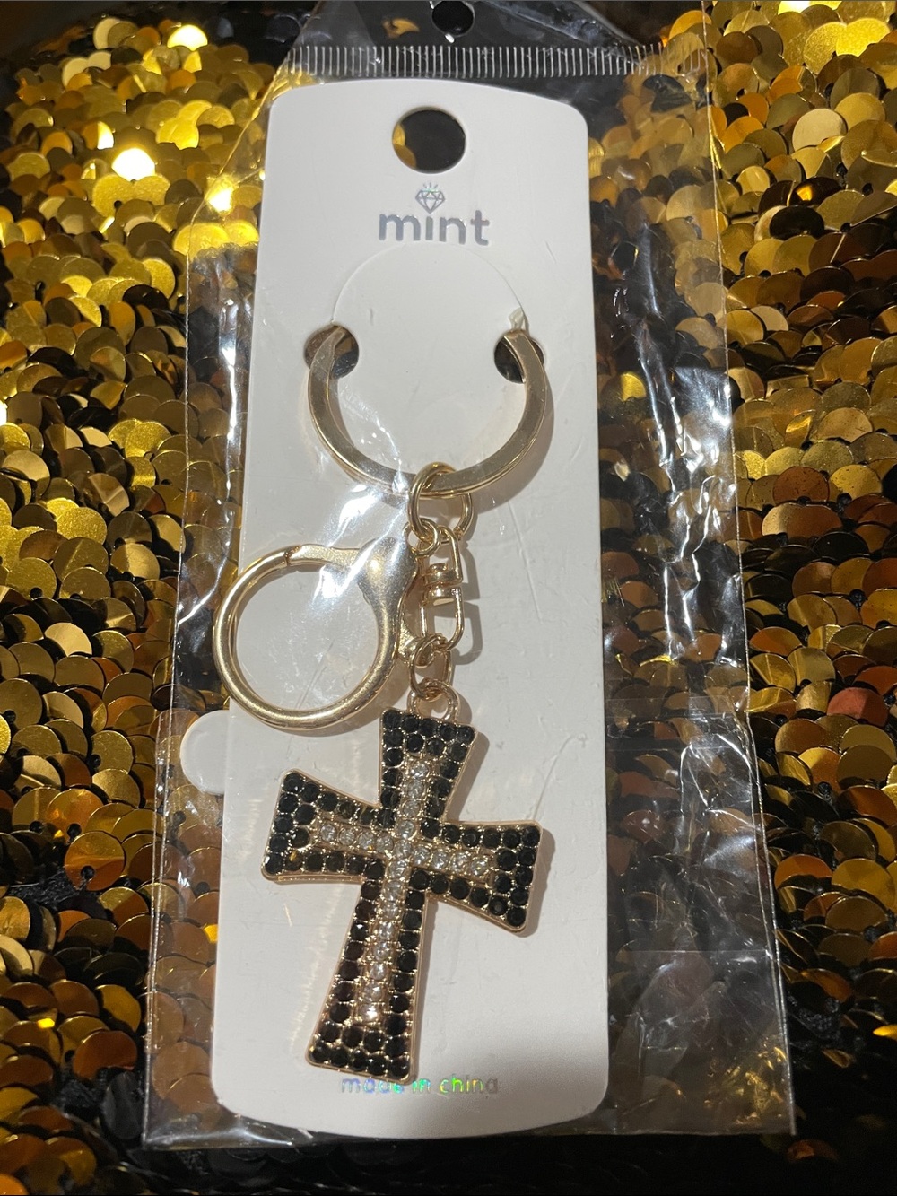 Mint Gold-Tone Keychain with Black Crystal Cross Bag Charm